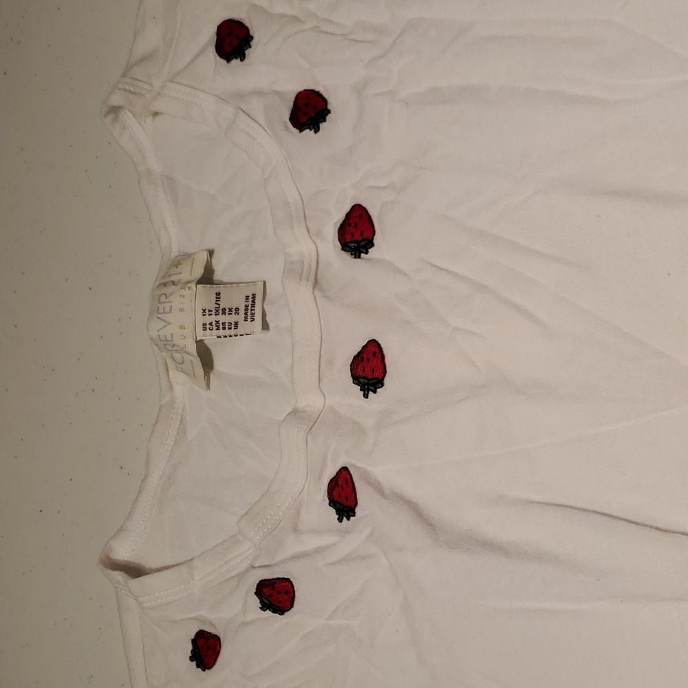 White T-shirt with Strawberries around the neck